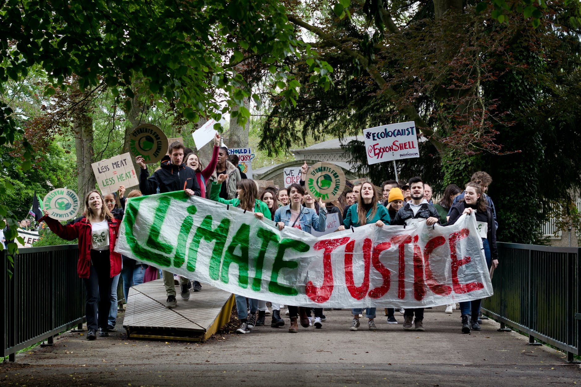 people holding banner